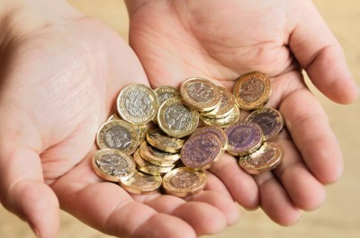 A Handful Of Pound Coins