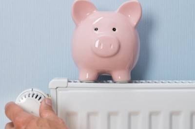 Thermostat with piggy bank