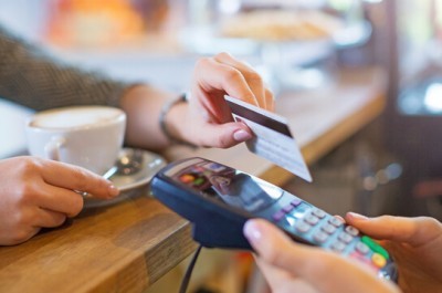 Customer Buying Coffee By Card