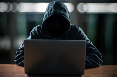 Fraudster On A Laptop