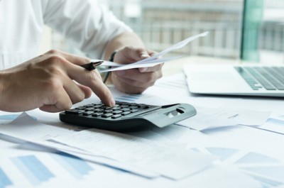 Man Calculating His Tax