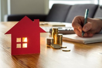 Man Calculating Housing Costs
