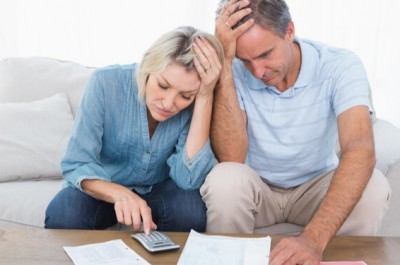 Middle Aged Couple In Debt