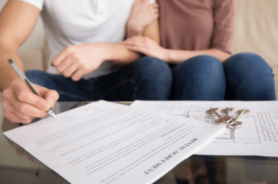 Renters Signing A Document
