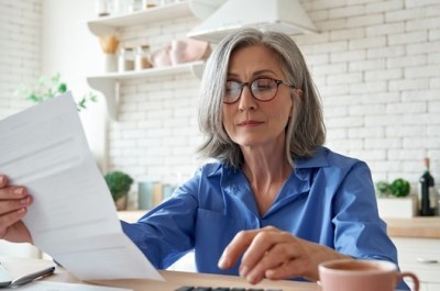 Senior Woman In Debt