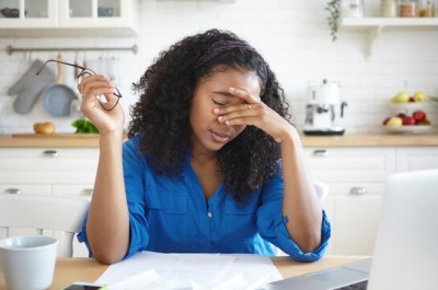 Tired Woman In Debt