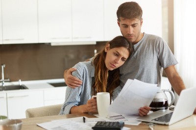 Unhappy Couple Deep In Debt