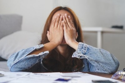 Woman Falling Into Debt