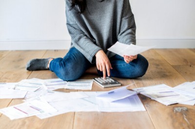 Woman Trying To Manage Debts