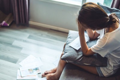 Woman Worried About Debts