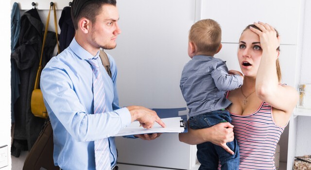 Debt Collector Talks To Young Parent
