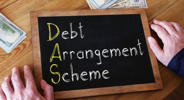 Debt arrangement scheme DAS is shown on the conceptual business photo