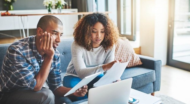 Couple looking at there debts