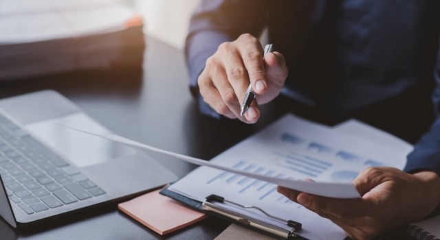 legal Business advisor working at office with documents on his desk, doing planning analyzing the financial report, business plan investment, finance analysis concept	