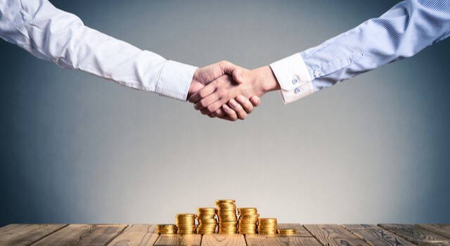 Shaking Hands Over A Settlement
