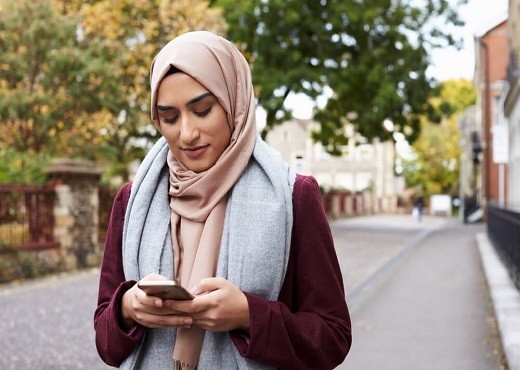 Woman texting on her phone